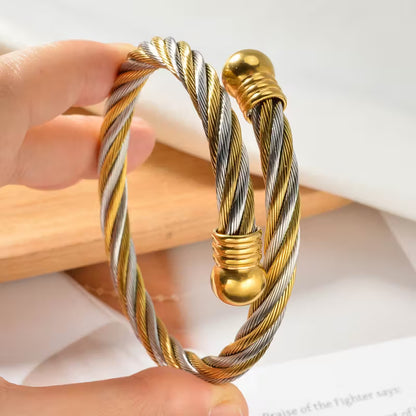 A posh Golden & Silvery Interwoven Bracelet